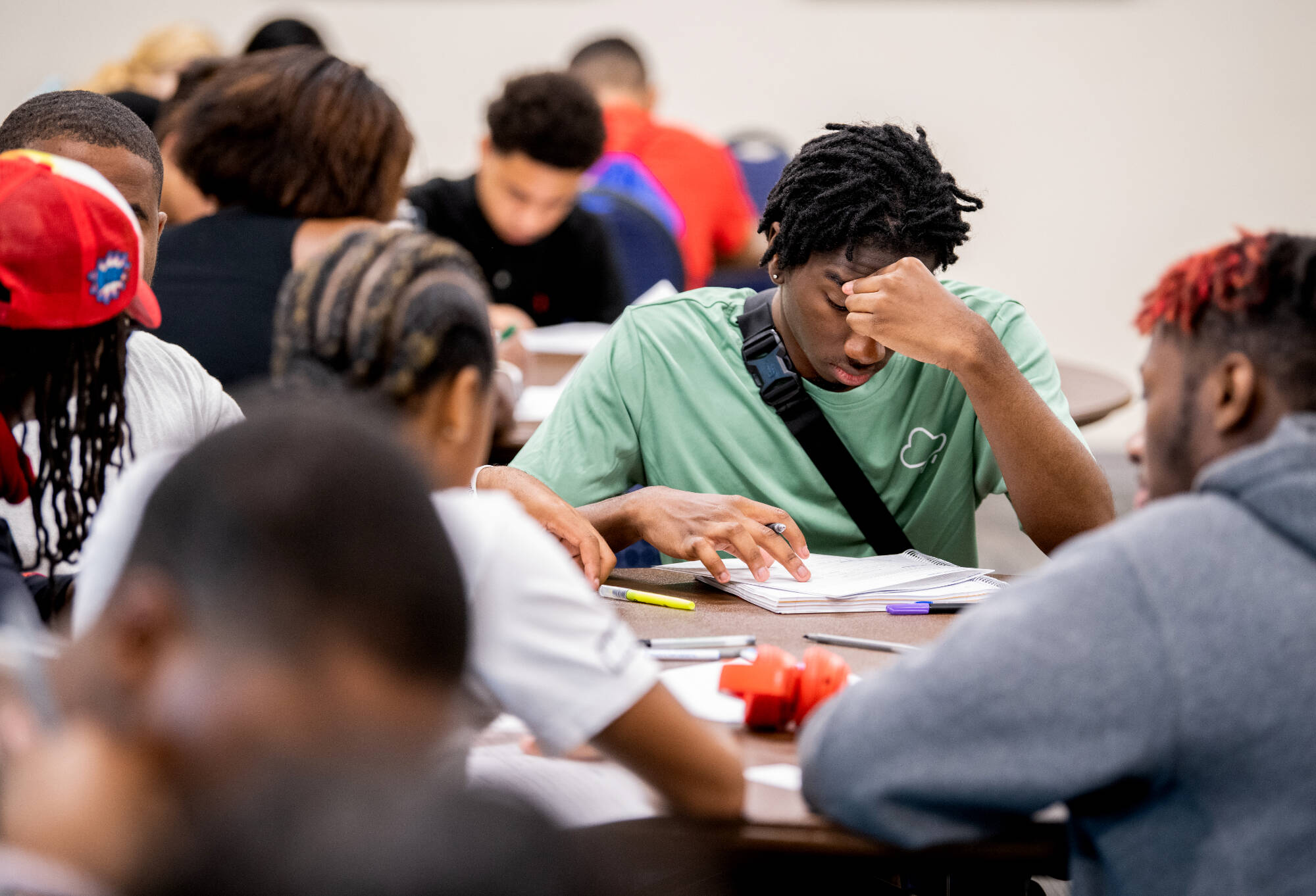 High school students work on filling out free GVSU college applications during college prep week at Grand Valley State University July 18. The GVSU Charter Schools Office invites junior and senior high school students from GVSU-authorized charter sc...